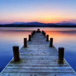 boat jetty sunset lake windermere lake district cumbria england uk europe